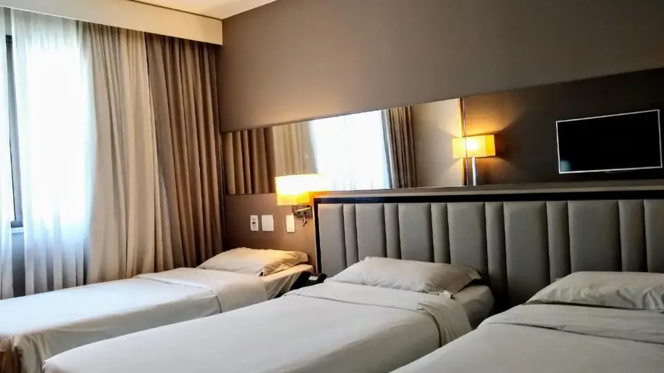 Deluxe Dreibettzimmer des Hotel Atlântico Prime
